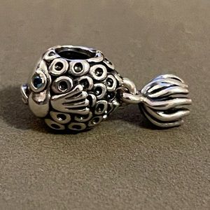 Fish charm with a dangly tail